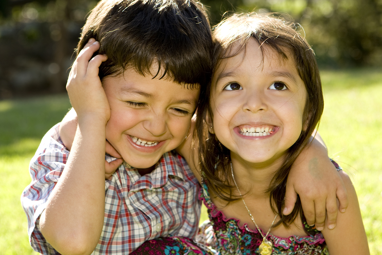 Brother and sister playing outside