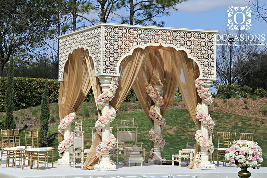 Outdoor-Mandap-with-Fresh-Floral-Wraps-and-Taupe-Drapery-OBSevents.jpg